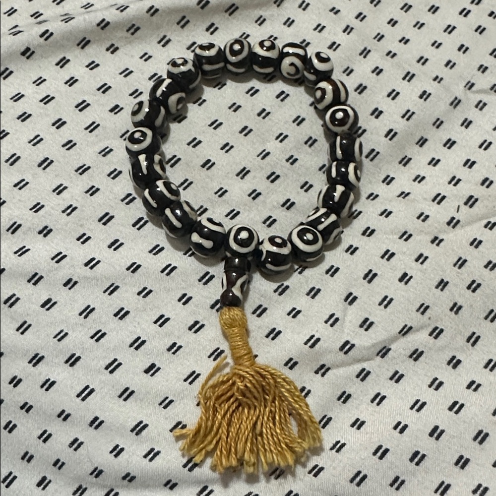 Black and White Beaded Bracelet with Tassel